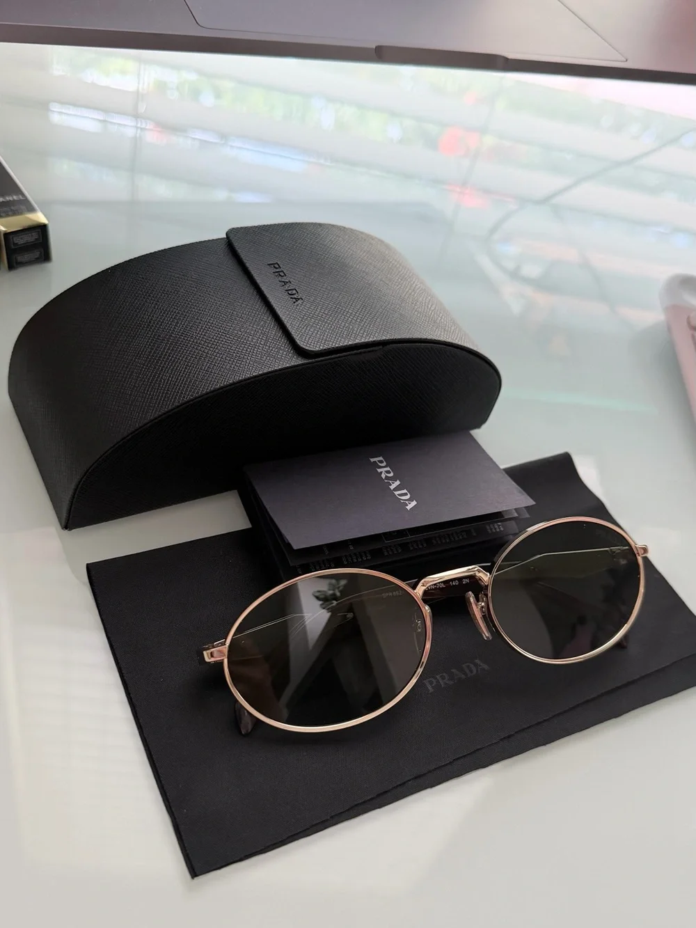 Prada Gold Frame Sunglasses with Green Lenses